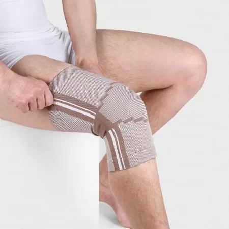 Бандаж на коленный сустав Экотен Ttoman KS-E02 с пружинными ребрами жесткости, бежевый 